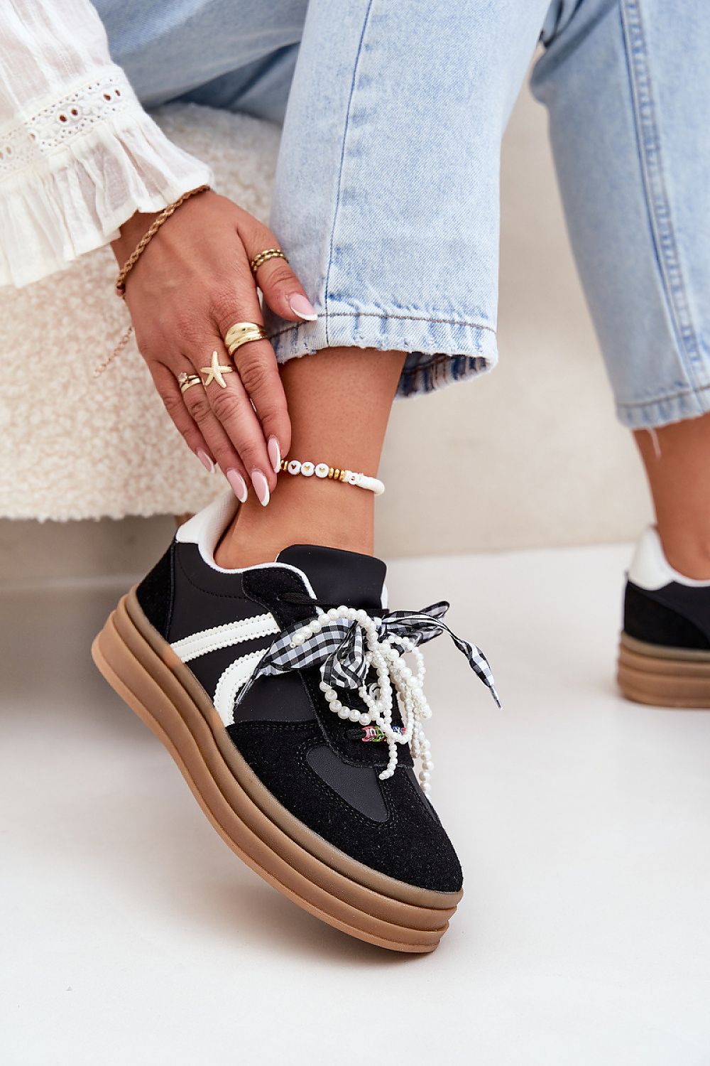 Contemporary eco-suede sneakers by Step in Style with a stylish platform and playful charm laces, ideal for a trendy outfit.