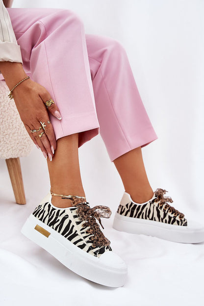 Elegant women's platform sneakers by Step in Style featuring decorative lacing and a comfortable foam insole, perfect for casual luxury.