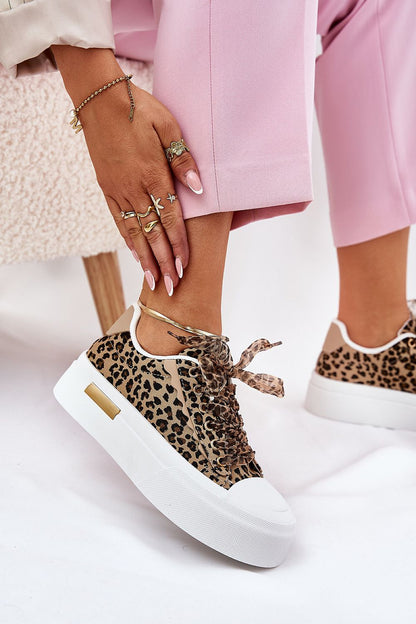 Sophisticated women's platform sneakers from Step in Style, featuring stylish decorative lacing and a soft foam insole, perfect for enhancing your high-end, casual ensembles.