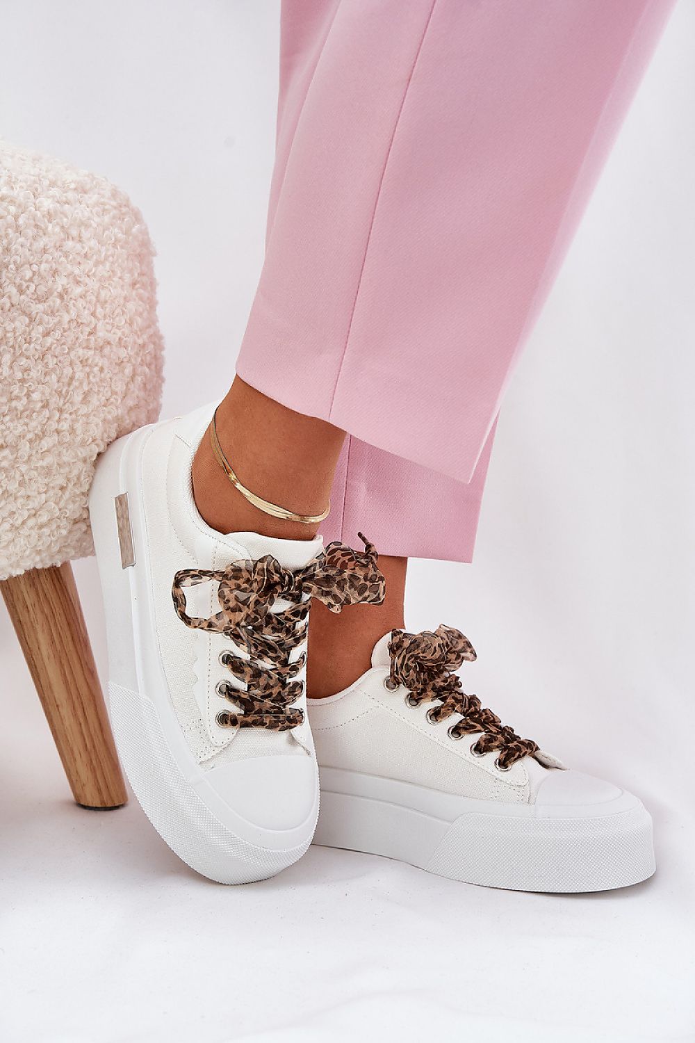Stylish women's platform sneakers by Step in Style in various EU sizes, combining comfort with trendy decorative lacing and a high-quality foam insole.