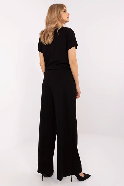 Close-up view of Relevance palazzo trousers showcasing the fine fabric blend of viscose, polyester, and elastane, designed for both comfort and style.