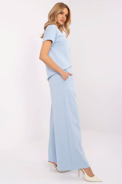 Chic palazzo tracksuit trousers by Relevance featuring a fashionable high waist and elegant pleats, perfect for both sporty and sophisticated outfits.