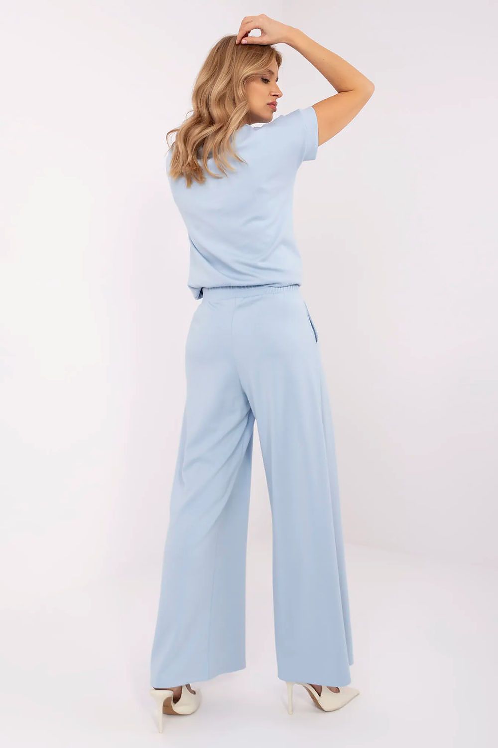 Relevance luxurious palazzo tracksuit trousers with practical side pockets and a trendy oversized fit, ideal for stylish everyday wear.
