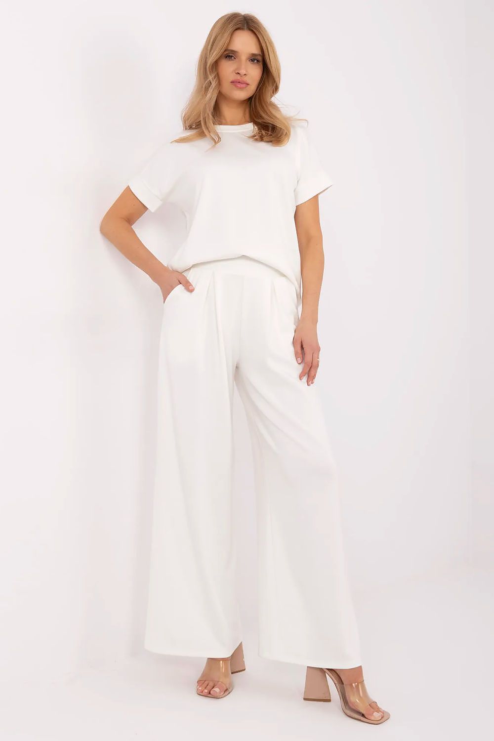 Stylish wide leg palazzo trousers from Relevance, crafted from a soft viscose blend, offering elegance and comfort for casual to formal occasions.