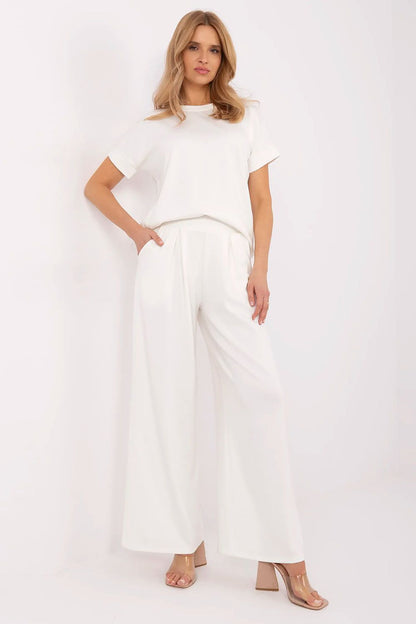 Stylish wide leg palazzo trousers from Relevance, crafted from a soft viscose blend, offering elegance and comfort for casual to formal occasions.