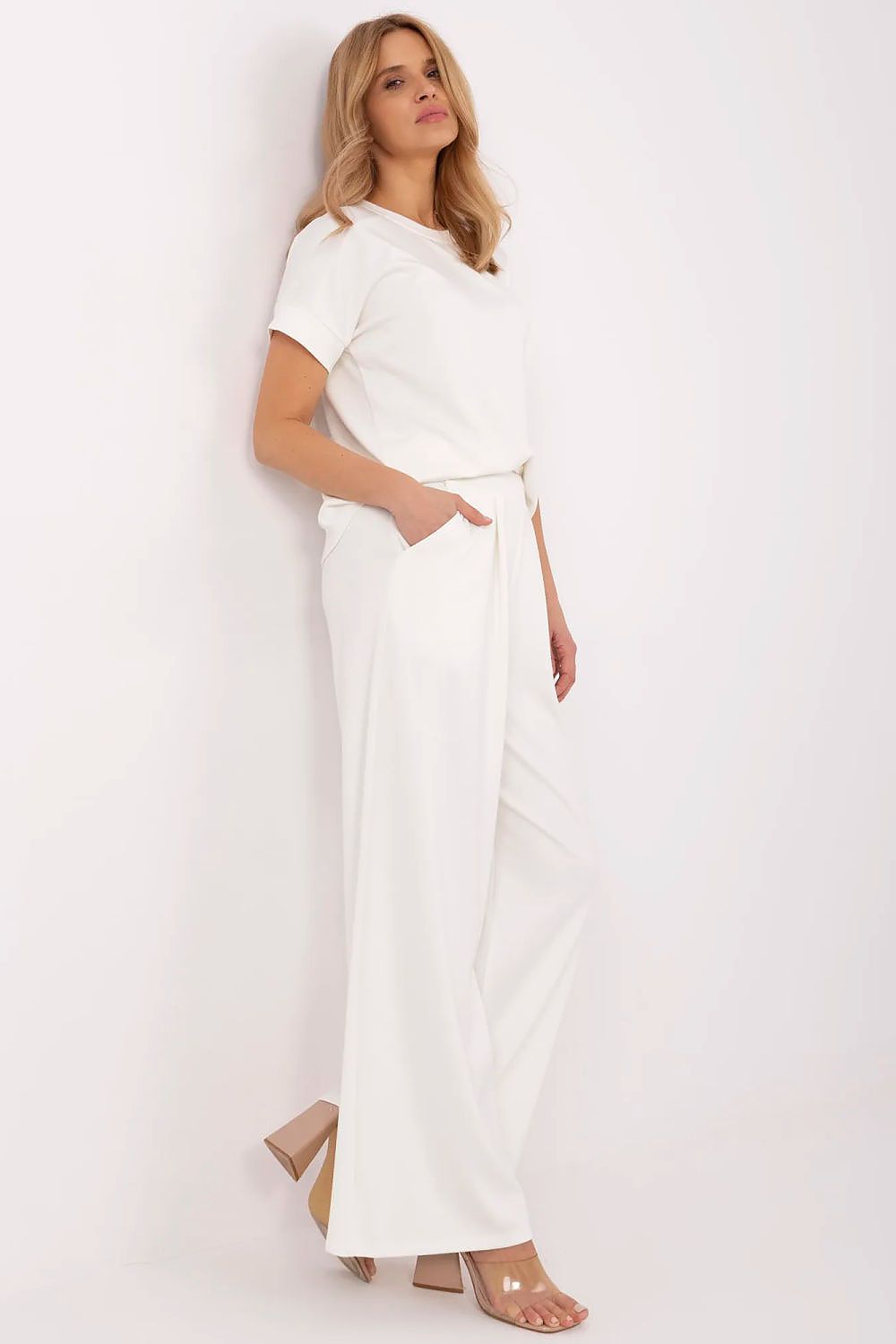 Sophisticated and comfortable palazzo tracksuit trousers by Relevance in EU sizes 0-4, designed with an elastic waistband and a modern aesthetic.