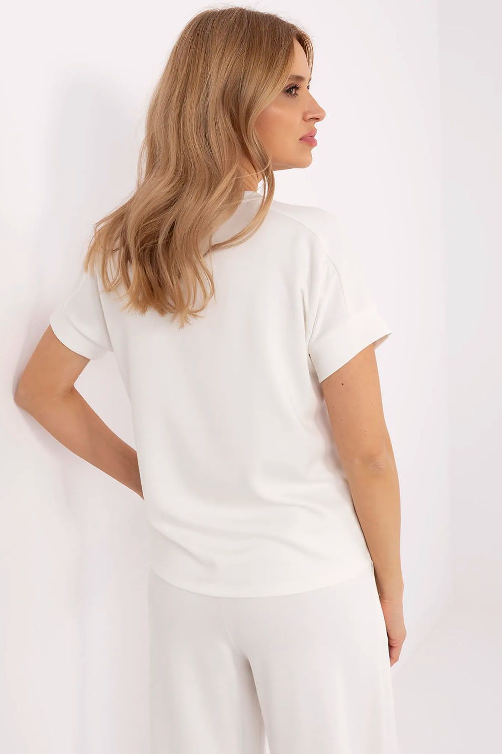 Relevance's Casual Classic Blouse, designed for effortless style, featuring a breathable viscose blend and a flattering fit suitable for EU sizes 0-4.