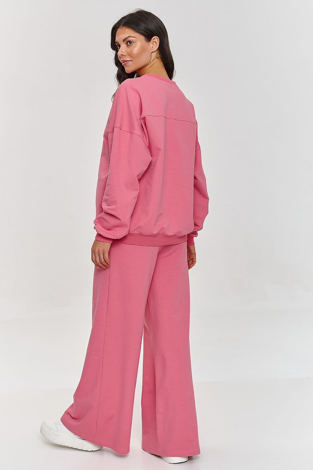 Fashionable women's Makadamia tracksuit set in elegant design, blending comfort with style for versatile wardrobe options.