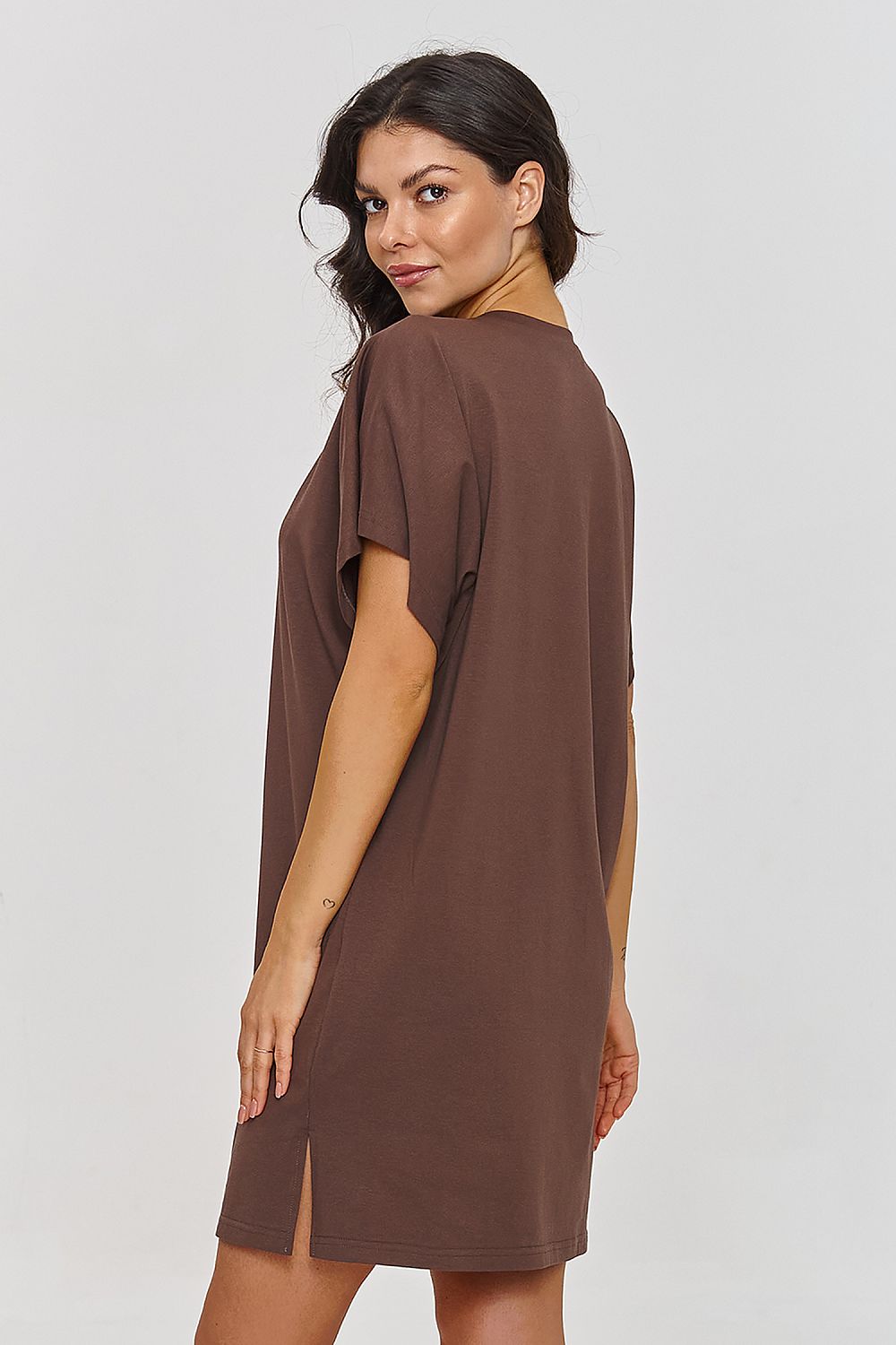 Close-up of the Makadamia Cotton Daydress detailing, highlighting its soft fabric and flattering round neckline.