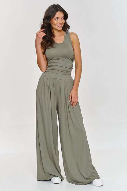 Luxurious close-up of Makadamia's viscose fabric showcasing the soft texture suitable for comfortable casual or semi-formal wear.