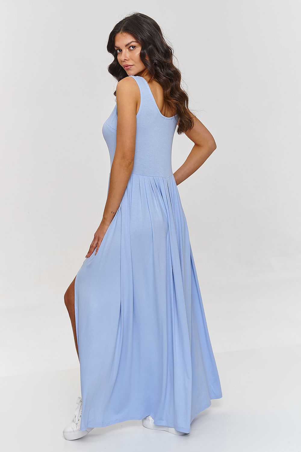 Full view of Makadamia's fashionable maxi dress, highlighting its graceful silhouette and elegant side slit, ideal for both casual and formal occasions.