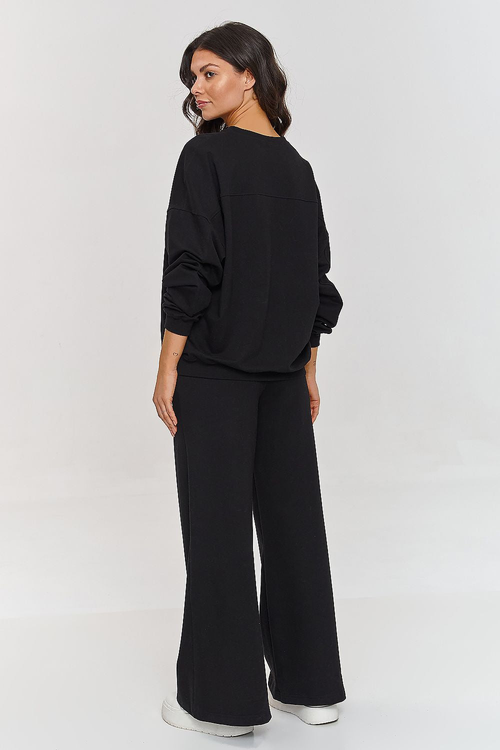 Trendy Makadamia women's flared tracksuit set, designed for style and comfort, ideal for both home and social wear.