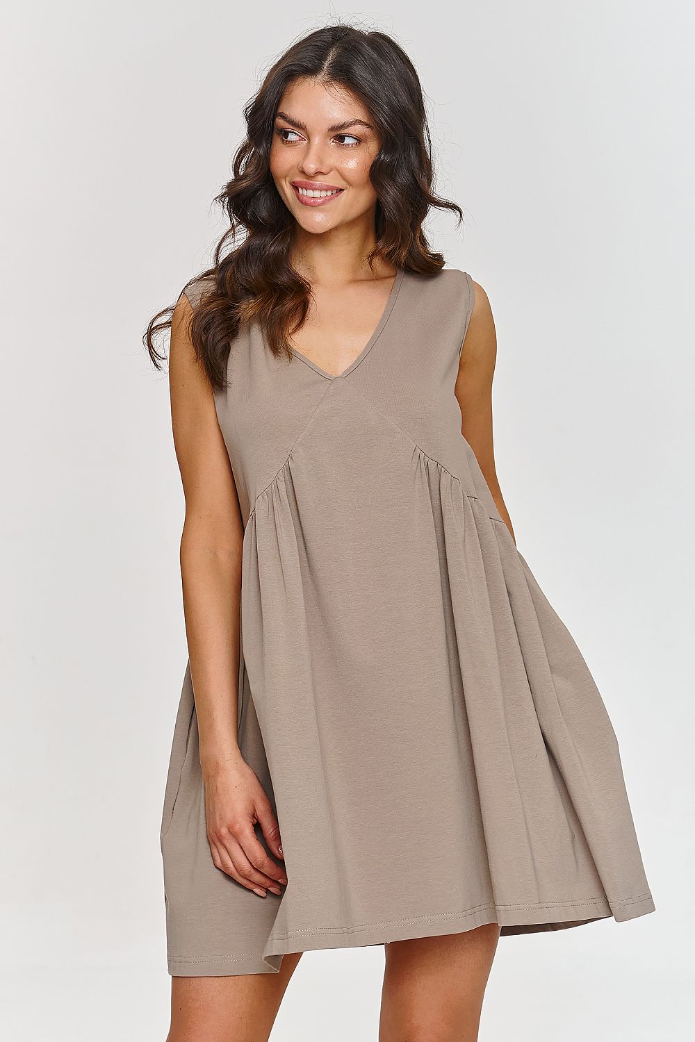 Stylish Makadamia mini trapeze dress designed with a flattering sweetheart neckline and loose fit for ultimate comfort.