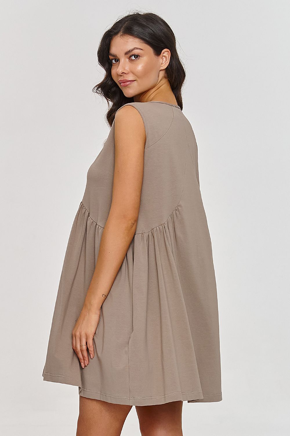 Versatile Makadamia daydress with a mini length and trapeze silhouette, ideal for casual outings or elegant evening wear.