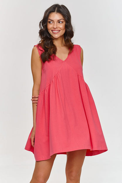 Luxurious Makadamia dress featuring a feminine sweetheart neckline and comfortable cotton design, perfect for any stylish wardrobe.