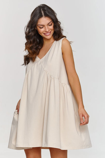 Stylish Makadamia trapeze dress featuring a flattering sweetheart neckline, ideal for casual and formal outings.