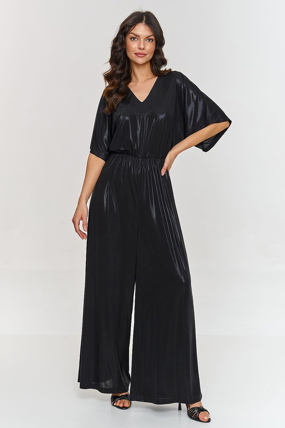 Luxury Makadamia metallic jumpsuit featuring a V-neck and elegant kimono sleeves, showcasing a stylish design ideal for special occasions.
