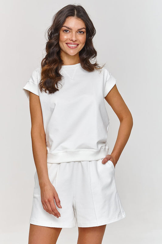 Elegant Makadamia summer tracksuit set featuring a loose fit blouse and shorts, perfect for luxurious casual wear during warm weather.