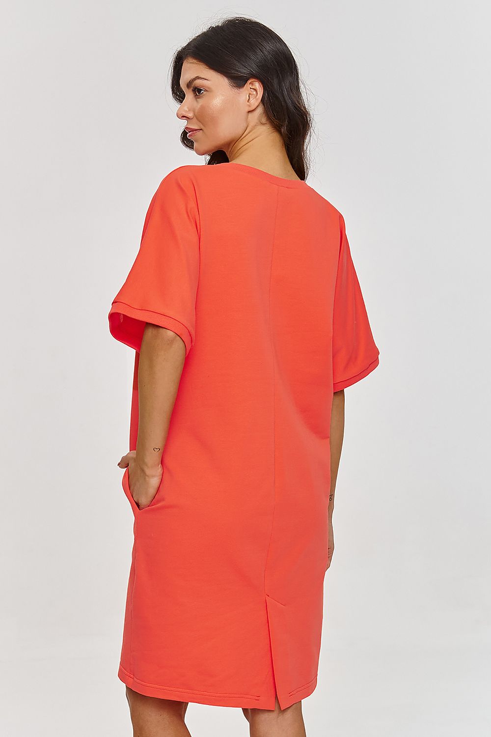 Makadamia's luxurious short sleeve dress in a sophisticated cotton blend, featuring a round neckline and a loose fit for ultimate comfort and chic elegance.