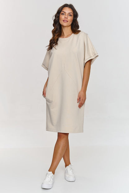 Stunning cotton blend dress by Makadamia, adorned with subtle stitching details, embodying a modern yet timeless design ideal for both casual and formal looks.