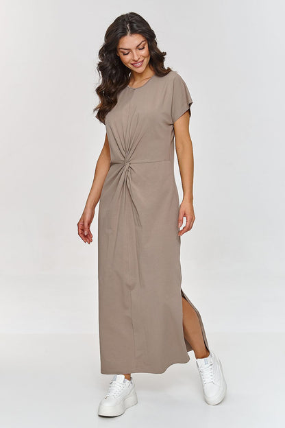 Elegant Makadamia Women's Maxi Dress featuring a chic side slit and feminine waist gathering, crafted from breathable cotton for ultimate comfort and style.