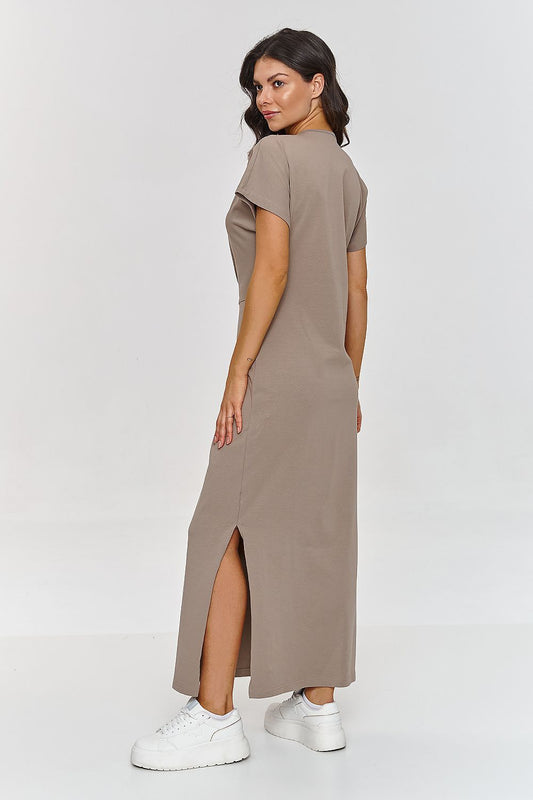 Sophisticated Makadamia Women's Maxi Dress, highlighting a round neckline and short sleeves, perfect for both casual outings and elegant events.