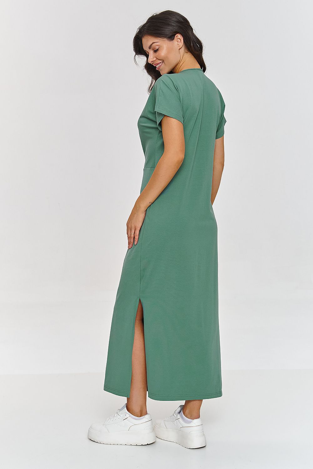 Close-up of Makadamia Women's maxi dress showcasing intricate gathering at the waist, epitomising sophistication and style.