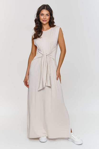 Chic Makadamia maxi dress showcasing a classic round neckline and loose fit, ideal for casual outings and formal occasions.