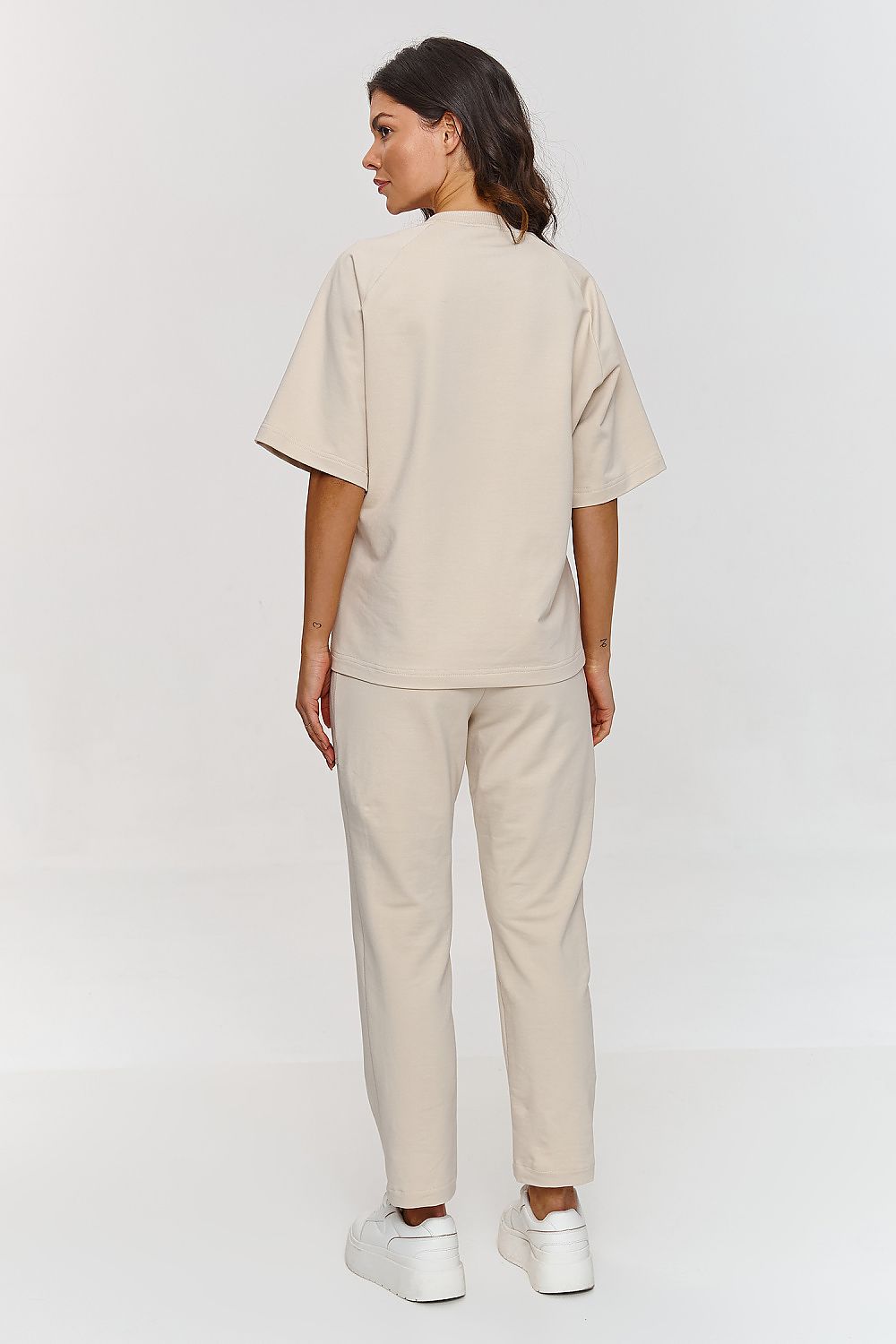 Versatile Makadamia Comfort Tracksuit Set in various sizes, embodying luxury, comfort, and timeless style for modern women.