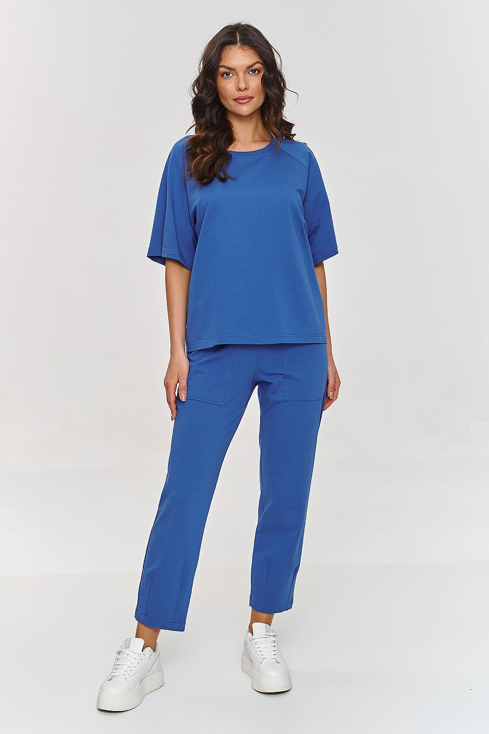 Makadamia Comfort Tracksuit Set in soft cotton featuring a loose blouse and classic pants, perfect for stylish everyday wear.