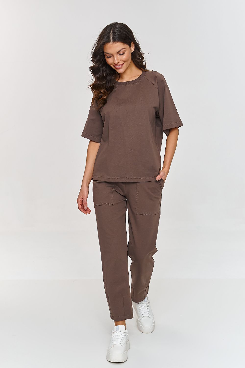 Detail of Makadamia's Comfort Tracksuit Set highlighting the delicate ribbing and raglan sleeves on the blouse.