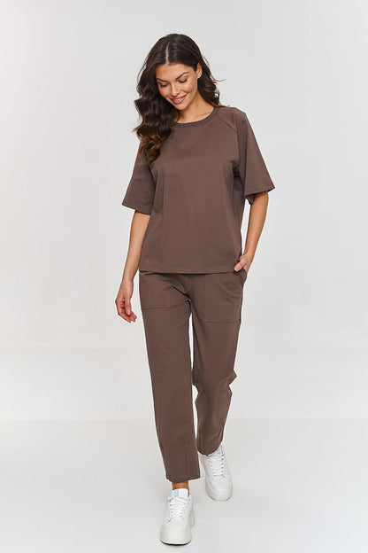Detail of Makadamia's Comfort Tracksuit Set highlighting the delicate ribbing and raglan sleeves on the blouse.