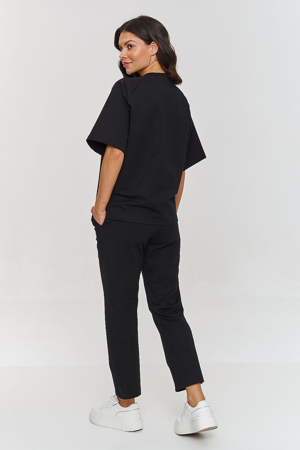 Luxurious Makadamia Comfort Tracksuit Set showcasing a loose blouse and classic pants, made from breathable cotton for stylish everyday wear in sizes EU 36-42.