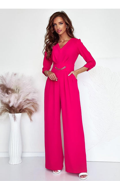 Elegant V-neck jumpsuit by With You, showcasing waist accent and stylish design, perfect for enhancing femininity and silhouette.