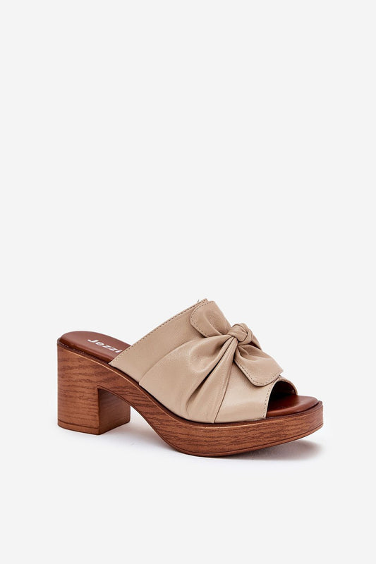 Stylish Jezzi Women's Eco-Friendly Leather Slippers with Decorative Tied Detail and 8cm Chunky Heel, available in sleek designs for EU Sizes 36-40.