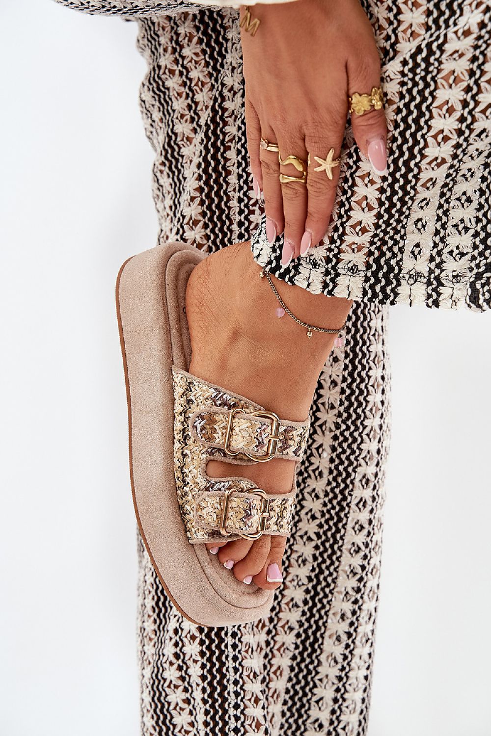 Trendy women's platform flip-flops with braiding details, designed by Step in Style for a luxury summer look.