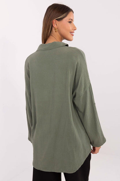 Italy Moda Women's Long Sleeve Muslin Shirt with roll-up sleeves, designed for comfort and featuring a chest pocket for a touch of sophistication.