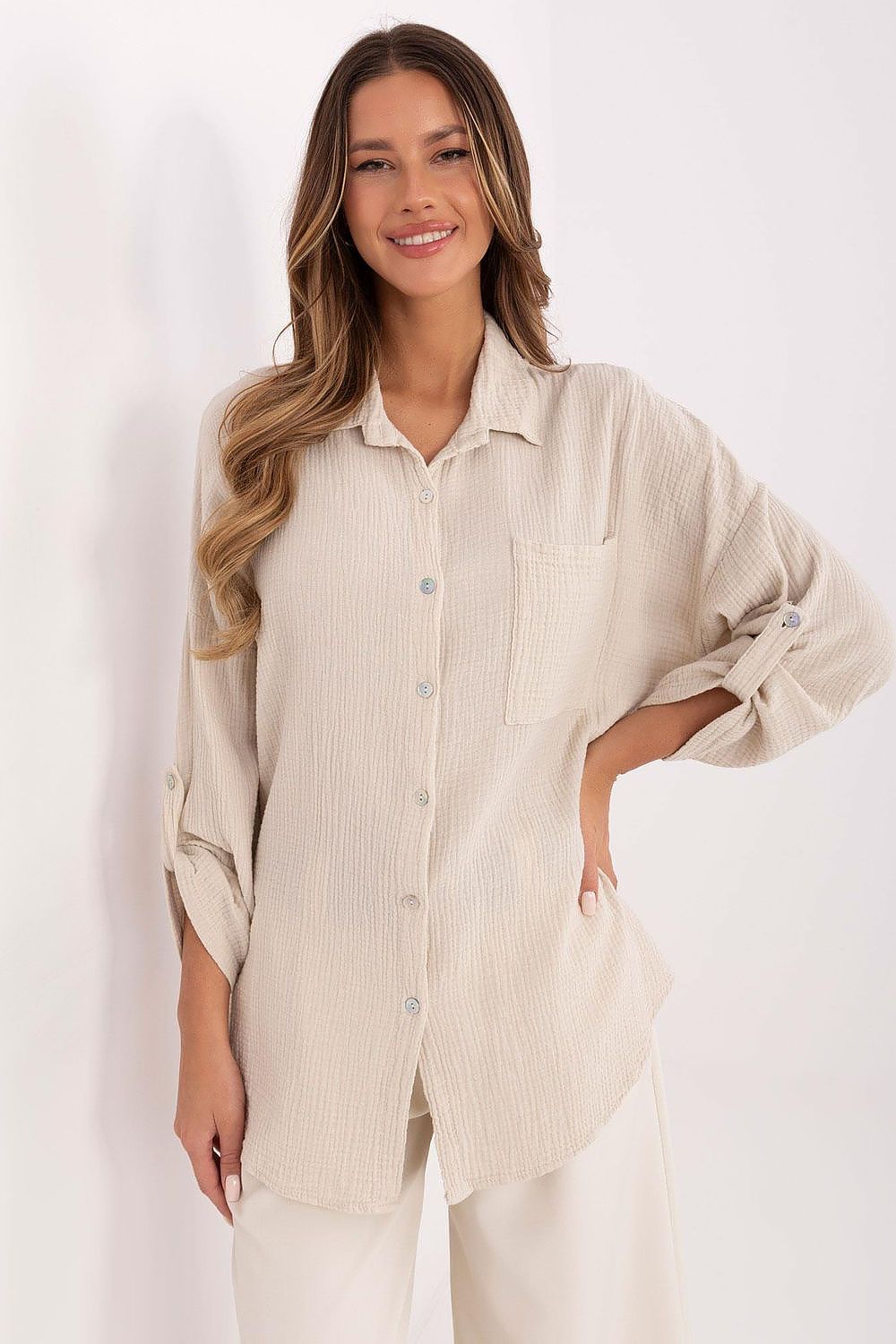 Italy Moda Women's luxurious long sleeve muslin shirt, 100% cotton, showcasing roll-up sleeves for versatile styling.