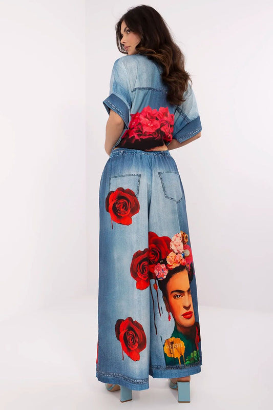 Elegant high waist palazzo pants for women by Italy Moda, featuring a lightweight viscose blend and a vibrant colourful print.