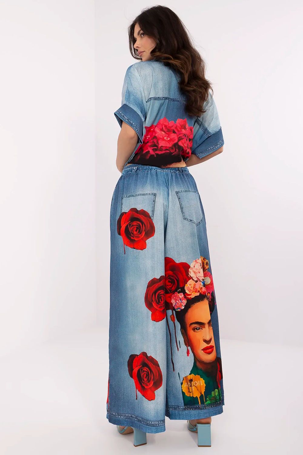 Elegant high waist palazzo pants for women by Italy Moda, featuring a lightweight viscose blend and a vibrant colourful print.