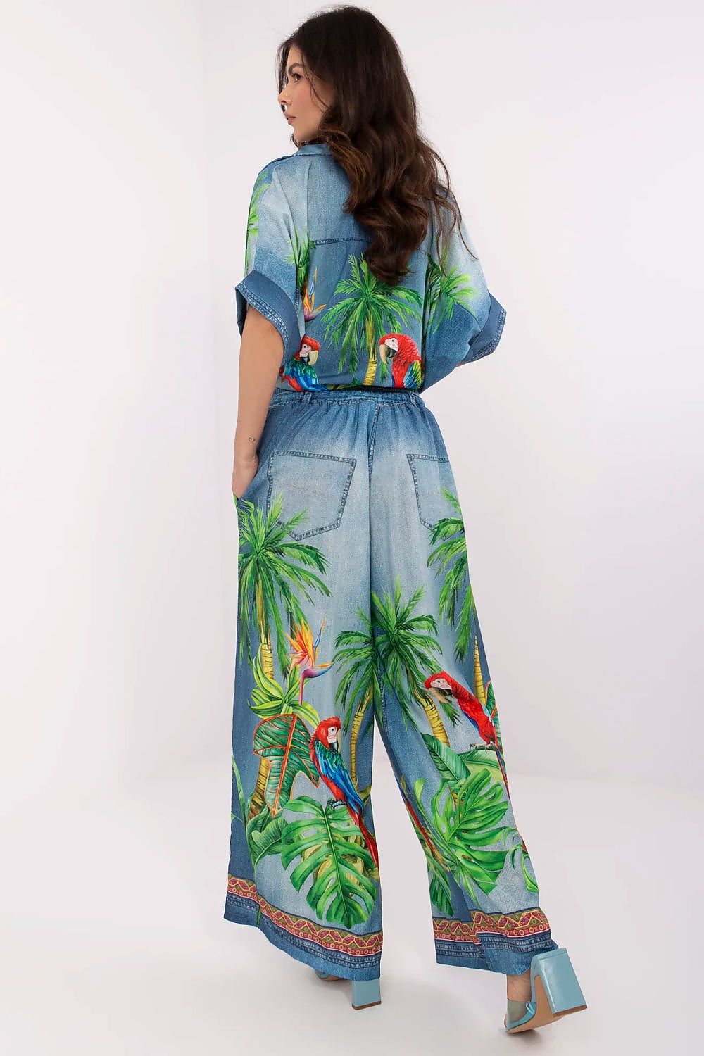 Close-up detail of Italy Moda's vibrant print on luxurious high waist palazzo pants, crafted for comfort and style.