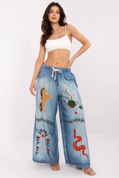 Model showcasing Italy Moda's elegant high waist palazzo pants, emphasising the fluid silhouette and breathable fabric.