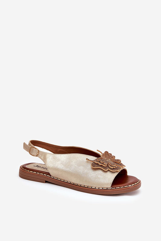 High-quality eco leather sandals by Jezzi from Step in Style, showcasing a flat heel and feminine design, perfect for pairing with dresses and pants.