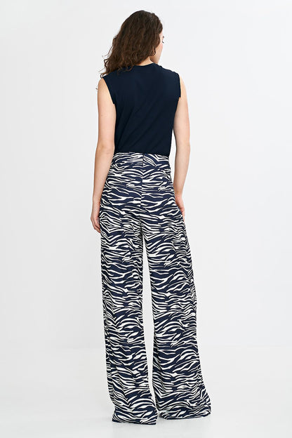 Stylish Nife women's palazzo trousers with wide legs and a discreet back zipper, perfect for both casual and formal wear, showcased in luxurious high-waisted design.
