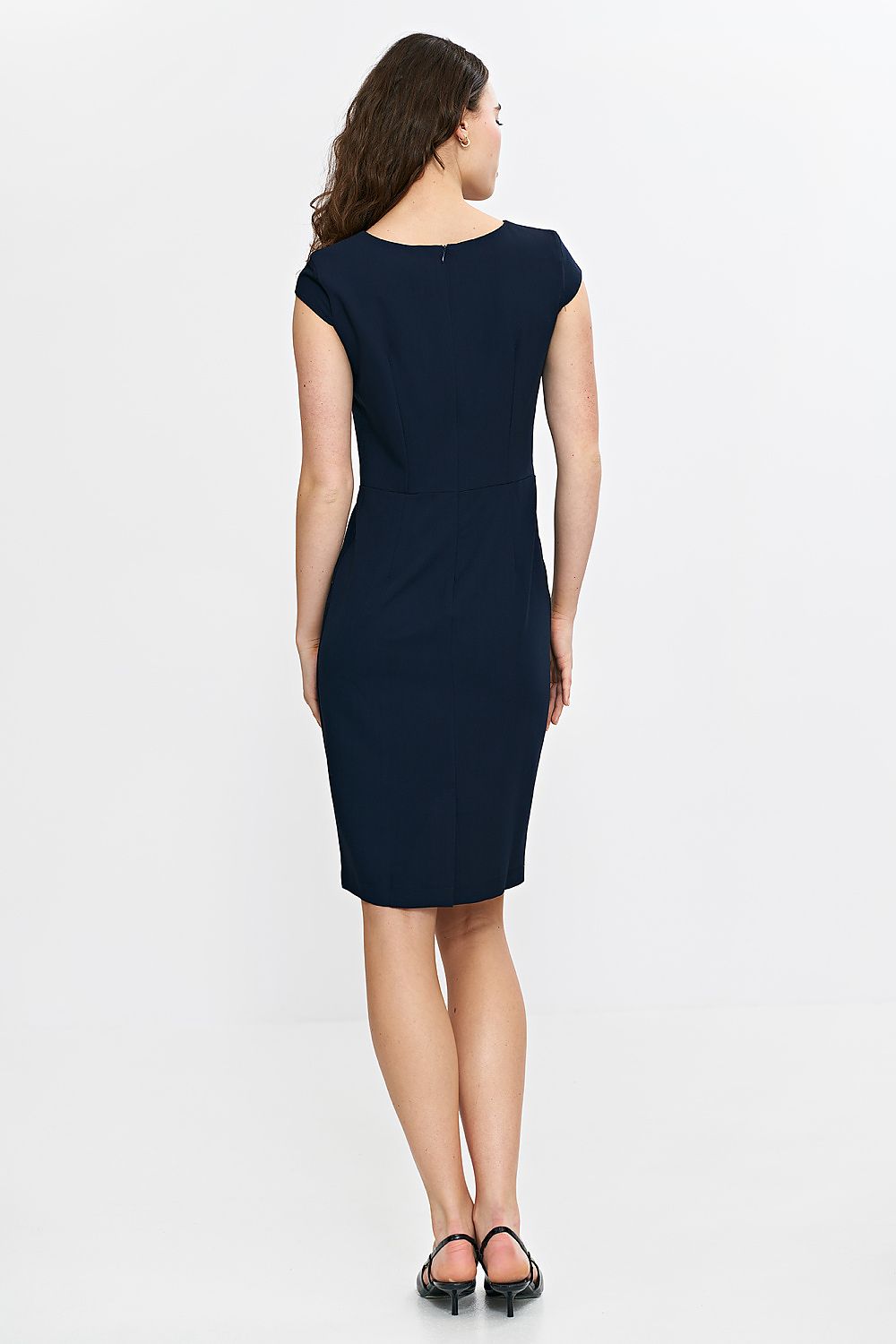 Nife Elegant Daydress displayed on a model, highlighting the classic knee-length and flattering cap sleeves for a timeless feminine style.