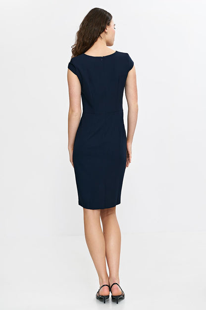 Nife Elegant Daydress displayed on a model, highlighting the classic knee-length and flattering cap sleeves for a timeless feminine style.