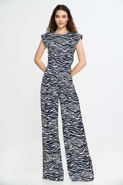 Chic palazzo trousers of the Nife women's jumpsuit accentuating a refined silhouette, perfect for special occasions and elegant outings.