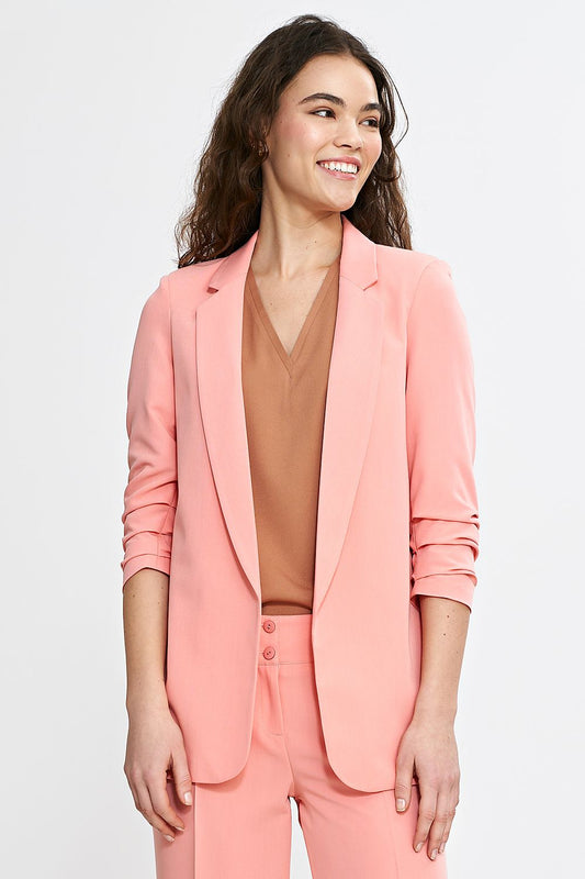 Elegant women's blazer with 3/4 sleeves and shoulder pads from Nife, featuring a loose cut and classic lapels for a sophisticated look.