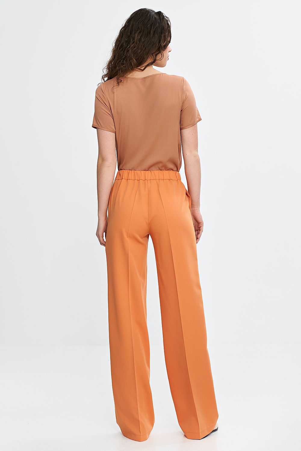 Stylish regular fit wide leg trousers for women by Nife, crafted for comfort and fashion.