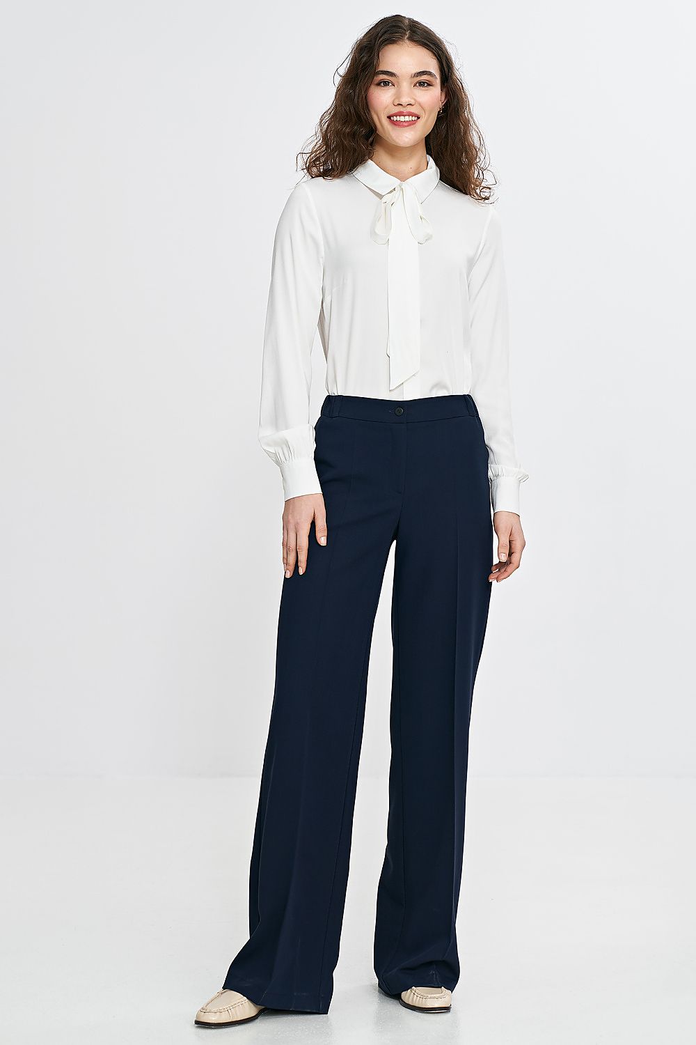 Nife's elegant wide leg trousers, designed for the modern woman seeking a blend of comfort and style.
